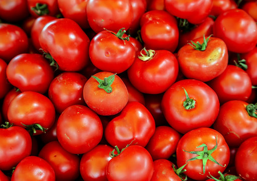 fresh red tomatoes closeup vegetable background Top view