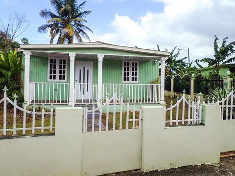 Puerto Rico Mint Green House With Gate