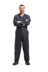 Obraz na płótnie Canvas Mechanic in a dark blue overalls