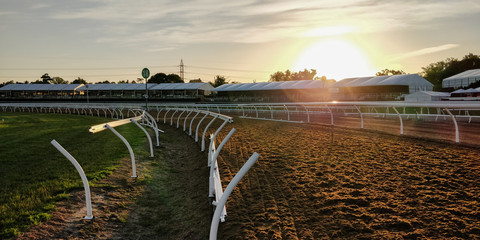 Horse racing grounds with sunset in the background