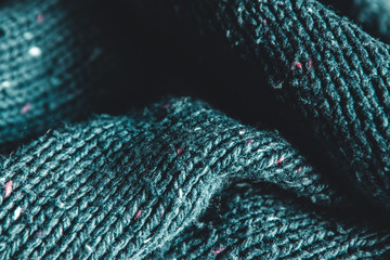 close up blue knitted pullover background