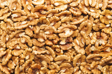 Many tasty walnuts as background
