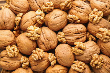 Many tasty walnuts as background