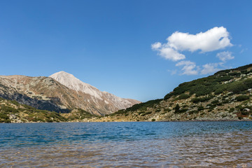 Fototapeta na wymiar Fish Banderitsa lake and Vihren Peak, Pirin Mountain, Bulgaria