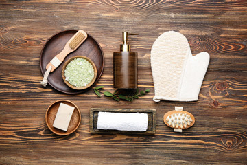 Set of bath accessories on wooden background