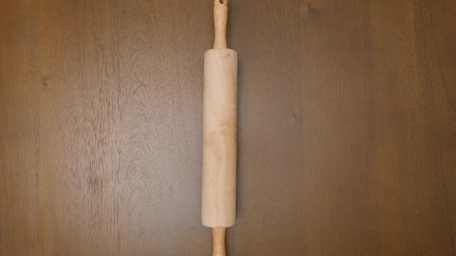 Rolling pin placed on table straight
