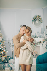  Christmas couple. Sensual. Gifts. Man and woman. Posing. Background. Girl. 