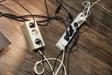 Cables and extension blocks, electreic devices in a mess