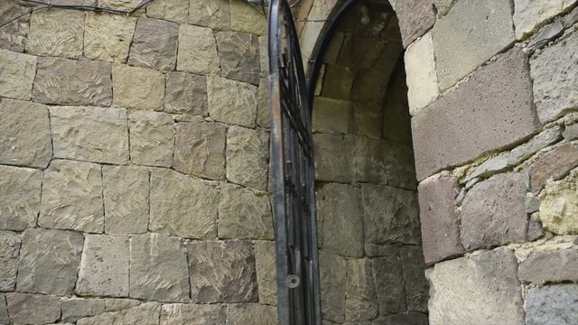 Doors of the Armenian Church. The metal door opens slowly. 