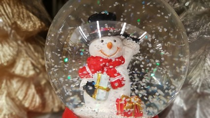 Merry snowman snow globe