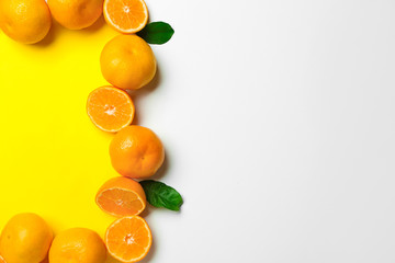 Frame made of ripe tasty tangerines on white background