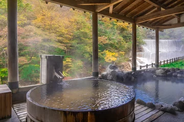 Wall murals Kyoto Japanese Hot Springs Onsen Natural Bath Surrounded by red-yellow leaves. In fall leaves fall in Fukushima, Japan.