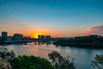 Naklejka premium view of city at sunset