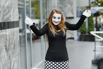 The girl with makeup of the mime. improvisation.