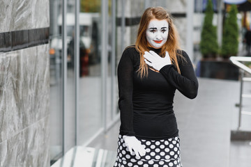 The girl with makeup of the mime. improvisation.