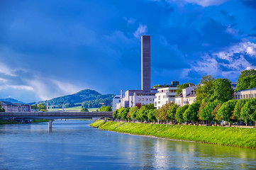 Fototapeta na wymiar A view of the Austrian city of Salzburg along the Salzach River.
