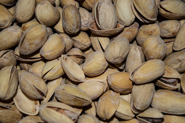 The texture is roasted with salt pistachios. Background image. Close up