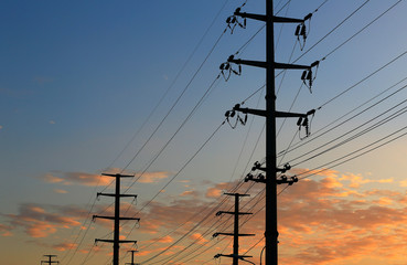 High voltage tower, silhouetted in the evening