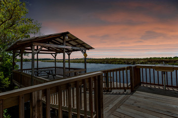 Dock at sunset overlooking the river