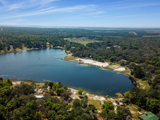 Fototapeta na wymiar View of a blue lake taken by a drone