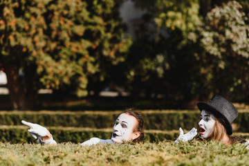 Street artists performing, Two mimes man and woman in april fools day