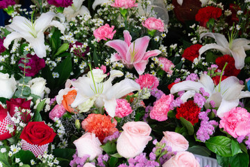 Carnation,Roses and  Chrysanthemum flowers  in bouquet at flower market,pattern background,selective focus