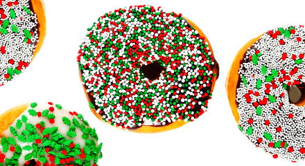 Sweet donuts with sprinkel on white background. Christmas donuts