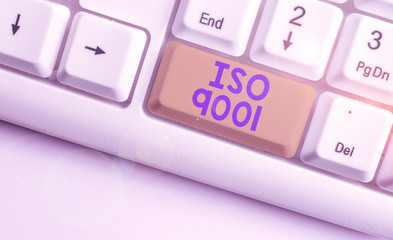 Handwriting text Iso 9001. Conceptual photo designed help organizations to ensure meet the needs of customers White pc keyboard with empty note paper above white background key copy space