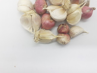 Onion Garlic Food Seasoning with Traditional Ethnic Minimalists Wooden Bowl in White Isolated Background