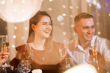 Friends at holiday table.