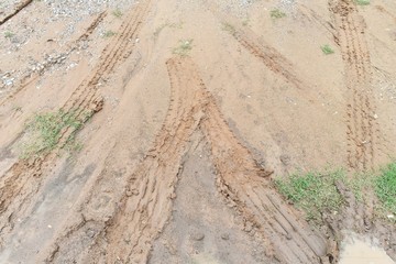 tire track of many vehicle on ground