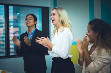 The young business team is happening the success of the business  business success concept