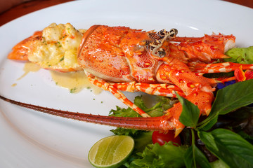 Baked Lobster on a white plate ,Luxury Seafood, Selective Focus of food.