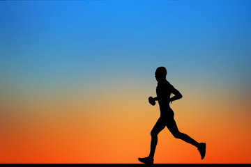 Fototapeta na wymiar silhouette Running athlete on sunset