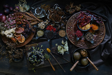 A variety spices and herbs in wooden bowls,  Of Asians For cooking.