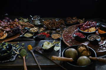 A variety spices and herbs in wooden bowls,  Of Asians For cooking.