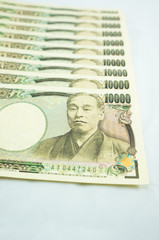 pile of many type japan banknotes,  yen currency. the currency which Influence on the world economy. money game powers. economy and funds concept.