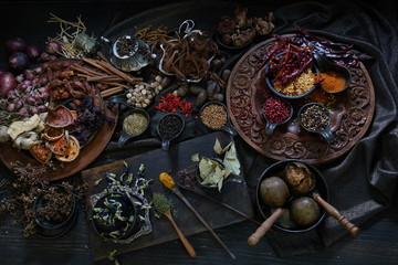 A variety spices and herbs in wooden bowls,  Of Asians For cooking.