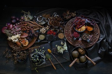 A variety spices and herbs in wooden bowls,  Of Asians For cooking.