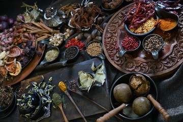 A variety spices and herbs in wooden bowls,  Of Asians For cooking.