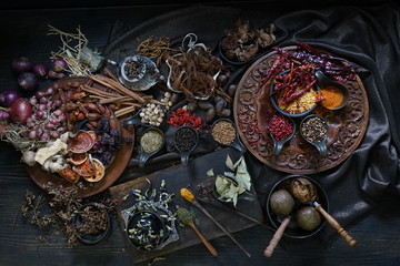 A variety spices and herbs in wooden bowls,  Of Asians For cooking.