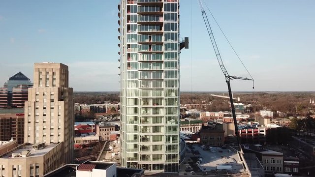 Aerial Crane Shot of Skyscraper Under Construction
