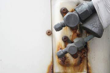 Close up a vintage cool and hot connection tube of air compressor.