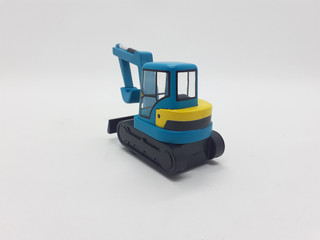 Fototapeta premium Photo Realistic Heavy Machinery Tractor Excavator Miniature Die Cast Toys Design for Souvenir Gift Collection Items in White Isolated Background 