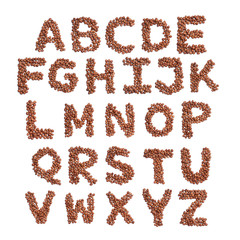 English alphabet from from hazelnut on a white isolated background. Food pattern made from nuts. Bright alphabet for shops.