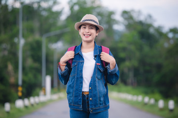 Happy young asian girl at Kang Kra Chan National Park Thailand