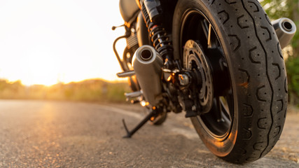 motorcycle in a sunny motorbike on the road riding.with sunset light. copyspace for your individual...