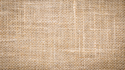 Cotton woven fabric background with flecks of varying colors of beige and brown. with copy space. office desk concept, Jute hessian sackcloth natura / Hessian sackcloth burlap woven texture background © suriyapong
