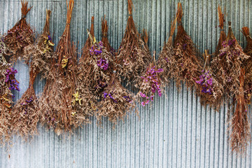 vintage dried bouquet hanging on the wall