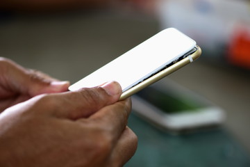 Close-up photos showing process of mobile phone repair 